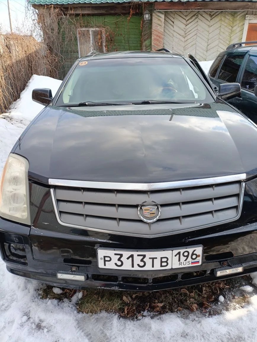 Cadillac SRX 2004 год