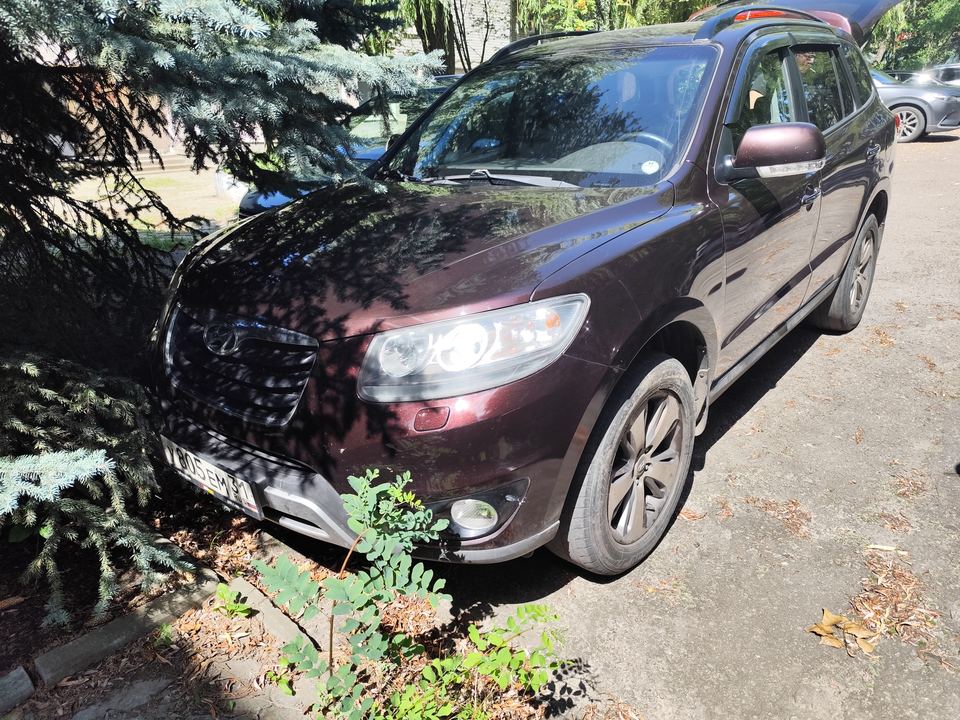 Hyundai Santa Fe 2011 год