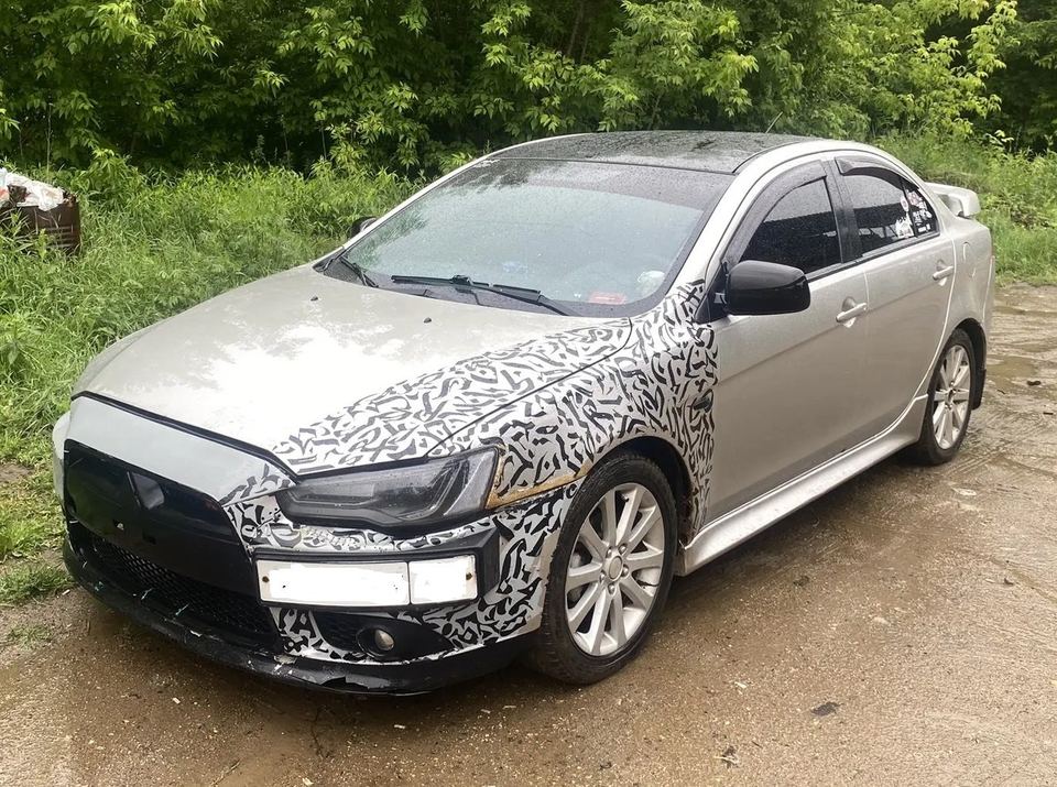Mitsubishi Lancer 2012 год