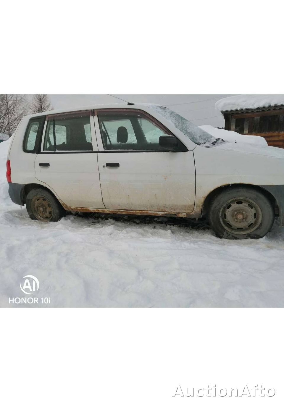 Mazda Demio 2002 год