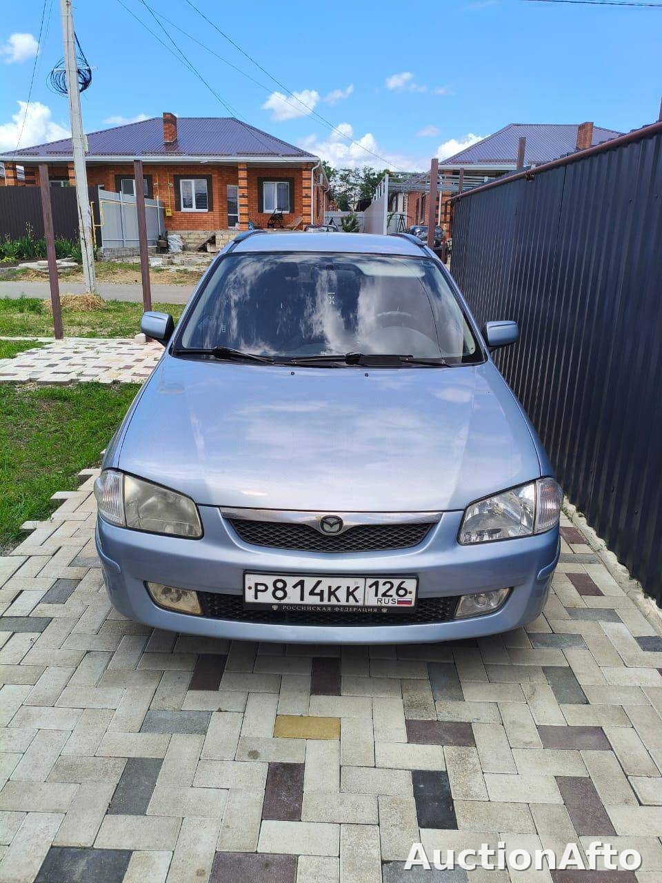 Mazda 323 1999 год
