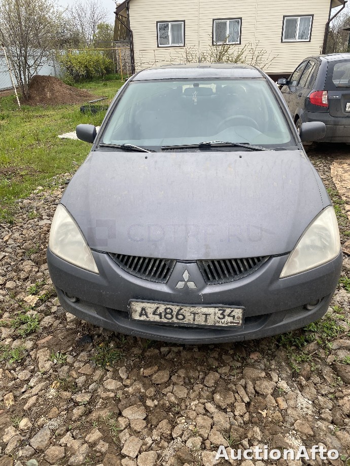 Mitsubishi LANCER 2004 год