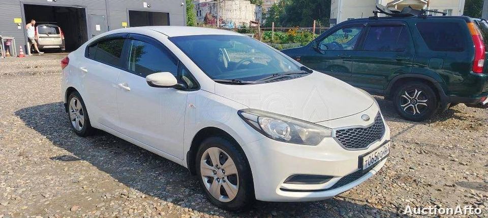 Kia Cerato 2013 год