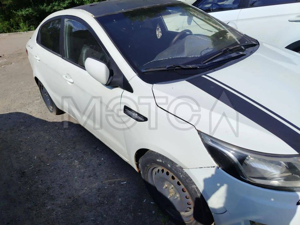 Kia Rio 2012 год