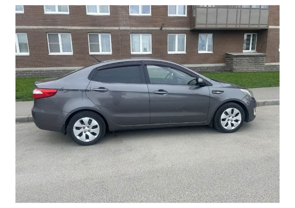 Kia Rio 2014 год