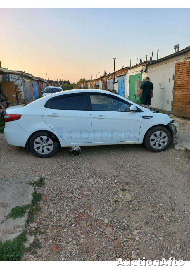 Kia Rio 2014 год
