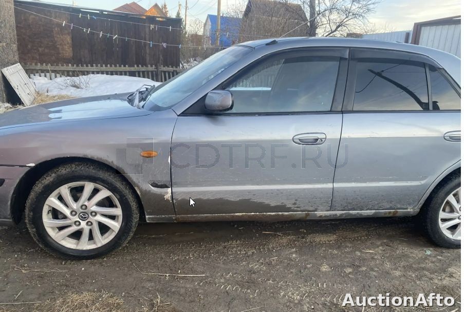 Mazda 626 1997 год