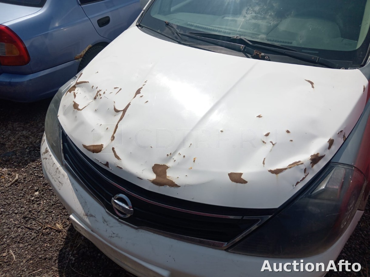 Nissan tiida 2013 год